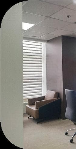 Corporate lounge area with comfortable seating and decor
